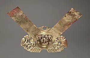 Nose Ornament with Human Head and Condors Attacking Humans by Unknown Artist