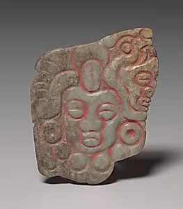 Offering Group: Plaque with Frontal and Profile Faces by Unknown Artist