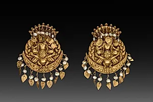 Pair of Earrings with Four-Armed Vishnu Riding Garuda with Nagas (serpent divinities) by Unknown Artist
