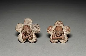 Pair of Figure in Flower Ornaments by Unknown Artist