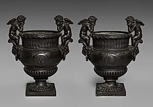 Pair of Urns with Putti by Unknown Artist