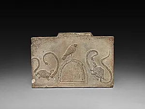 Panel from Model Cooking Stove:  Raven Flanked by Snake-Entwined Tortoises by Unknown Artist