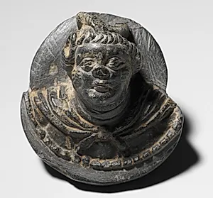 Plaque with a Male Head by Unknown Artist