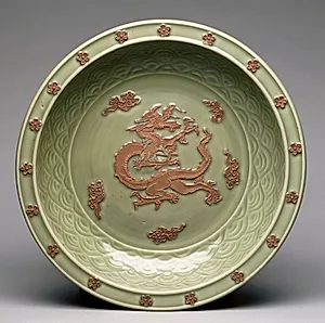 Plate with Relief Dragon among Clouds by Unknown Artist