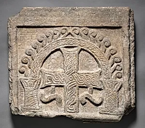 Relief Panel from the End of a Sarcophagus:  A Cross Within an Arch by Unknown Artist