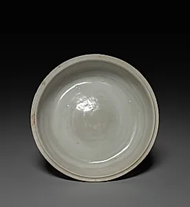 Round Covered Box with Floral Scrolls in Relief:  Qingbai type Ware by Unknown Artist