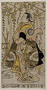 Sanjo Kantaro as a Young Woman Standing in a Wisteria Arbor by Torii Kiyonobu I (Japanese, 1664–1729)