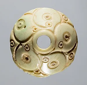 Spindle Whorl by Unknown Artist