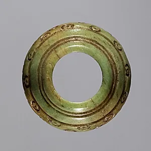 Spindle Whorl by Unknown Artist