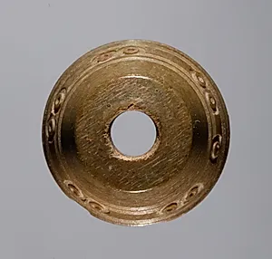 Spindle Whorl by Unknown Artist