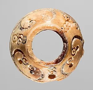 Spindle Whorl by Unknown Artist
