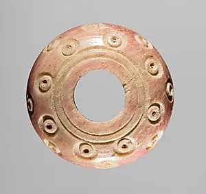 Spindle Whorl by Unknown Artist