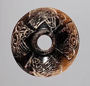 Spindle Whorl by Unknown Artist