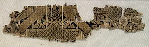 Textile Fragment with Portions of Eight-Pointed Star and Birds by Unknown Artist