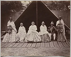 Three of Sri Tung Bahadur's Favorite Wives and His Youngest Son by Bourne & Shepherd (British, active India, 1868–2016)