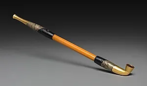 Tobacco Pipe with Maple Leaves in a River by Unknown Artist
