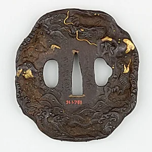 Sword Guard (<i>Tsuba</i>) Depicting Dragon in Waves (波に龍図鐔)