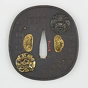 Sword Guard (<i>Tsuba</i>) Depicting Shishi Lion and Elephant (獅子象図鐔)