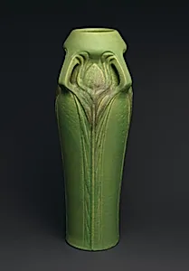 Vase with peacock feathers
