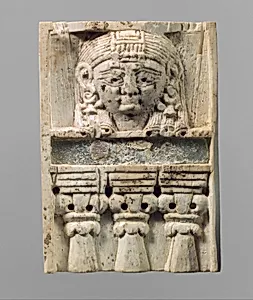 Furniture plaque carved in relief with a “woman at the window”