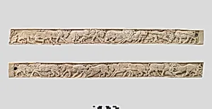 Furniture plaques carved in relief with animal combat