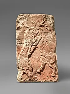 Orthostat relief: lion attacking a deer