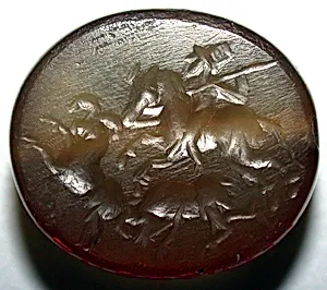Stamp seal and modern impression: hunter on horse attacking rams