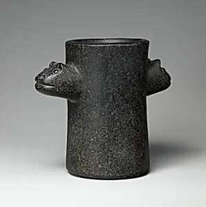 Beaker with animal heads