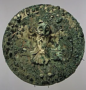 Shield with owl figure