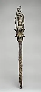 Staff: Seated Male Figure