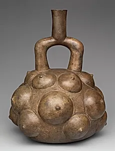 Stirrup-spout bottle with fruits