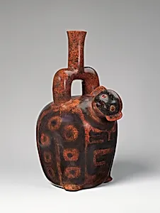 Stirrup-spout bottle with monkey and snake by Cupisnique artist(s)
