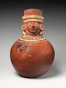 Vessel with face-neck