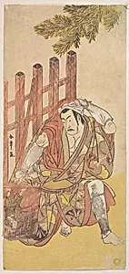The Fourth Matsumoto Koshiro as an Outlaw Looking at a Wooden Ninsogaki by Katsukawa Shunshō　勝川春章