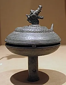 Rattle with a Coiled Serpent