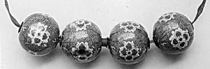 Beads (four)