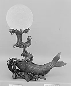 Crystal Ball on a Bronze Stand in the Shape of a Fish