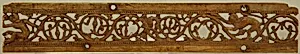 Foliated Scrolls Inhabited by Monkeys