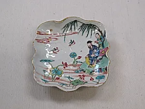 Dish with figures by a lotus pond