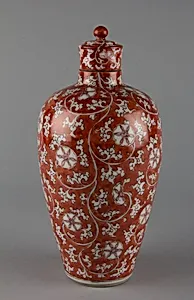 Covered bottle with floral scrolls (one of a pair) by Unknown Artist