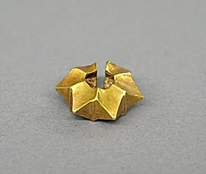 Ear Clip in the Shape of a Starfruit by Unknown Artist