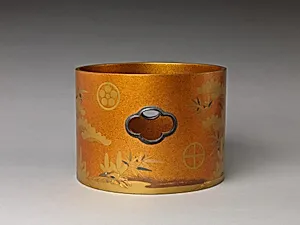 Shield (?) with Design of Pine, Bamboo, and Cherry Blossom