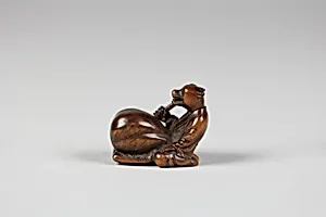 Netsuke: Tanuki no Hara Tsutsumi