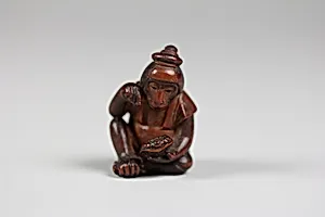 Netsuke of Monkey Examining Turtle