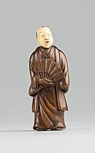 Netsuke of Figure with an Ivory Head by Unknown Artist