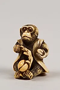 Netsuke in the Shape of a Monkey with a Peach