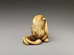 Netsuke of Octopus Holding Clam