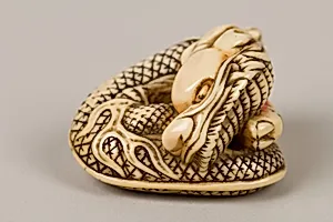Netsuke of Coiled Dragon Enclosing a Pearl