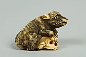Netsuke of Boar with a Human Skull