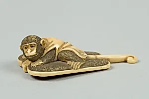 Netsuke of Monkey on a Bamboo Fan